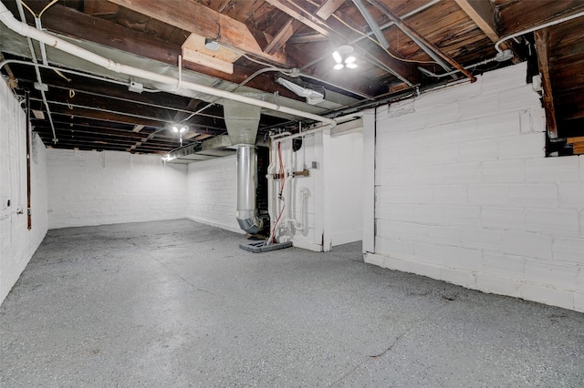 2403 E 14th St, Des Moines, IA 50316 - unfinished basement featuring concrete block wall