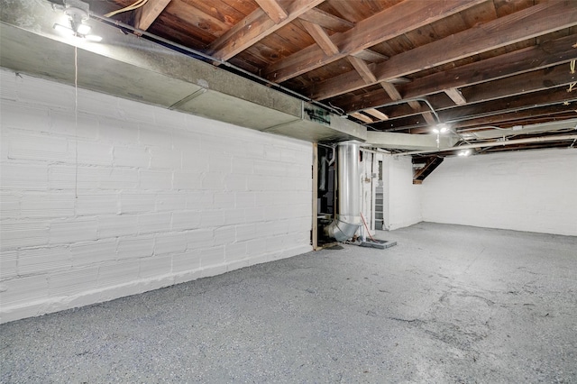 2403 E 14th St, Des Moines, IA 50316 - unfinished basement with stairway and concrete block wall