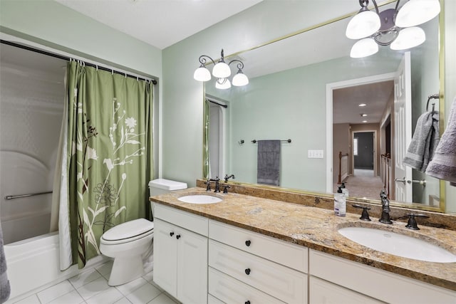 6909 Capitol View Ct, Johnston, IA 50131 - bathroom featuring shower / bath combo with shower curtain, double vanity, tile patterned floors, and toilet