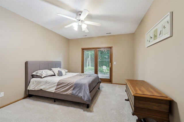 6909 Capitol View Ct, Johnston, IA 50131 - bedroom with access to outside, light colored carpet, baseboards, and a ceiling fan