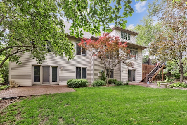6909 Capitol View Ct, Johnston, IA 50131 - back of house featuring a patio area, a yard, and stairway