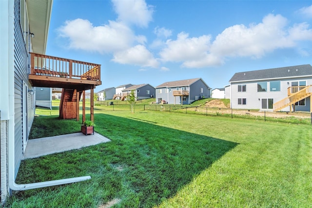 580 NW Rosemont Dr, Waukee, IA 50263 - view of yard with a residential view, a wooden deck, stairs, and a patio