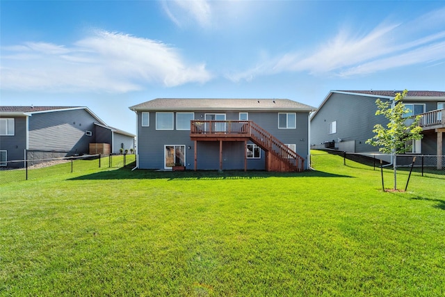 580 NW Rosemont Dr, Waukee, IA 50263 - back of property with stairs, a deck, and a fenced backyard