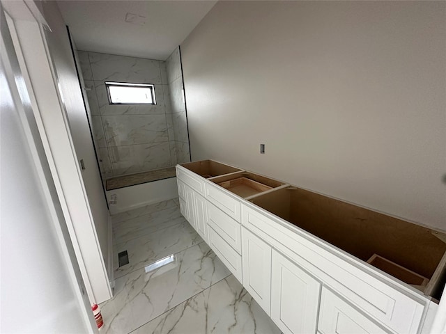 1405 NW Bull Run Ct, Waukee, IA 50263 - full bathroom featuring marble look tile flooring and a marble finish shower