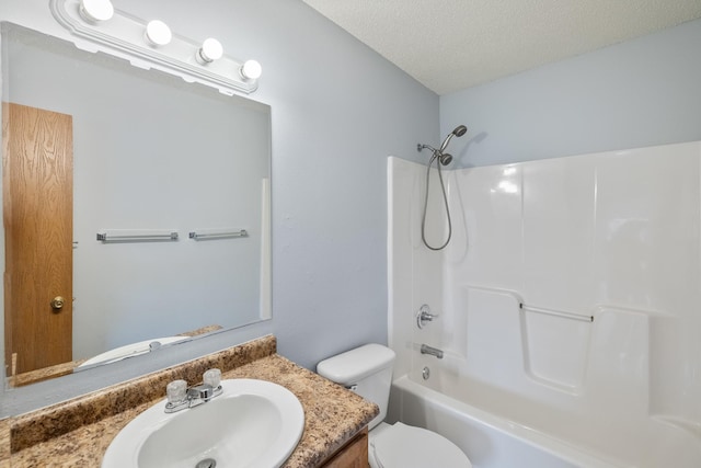 1540 8th St, Des Moines, IA 50314 - bathroom featuring vanity,  shower combination, and a textured ceiling