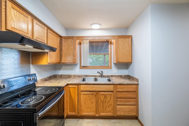 1540 8th St, Des Moines, IA 50314 - kitchen featuring black range with electric cooktop, under cabinet range hood, a textured ceiling, and tasteful backsplash