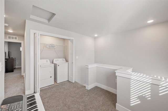714 Umbra Pl, Norwalk, IA 50211 - laundry area featuring washing machine and clothes dryer, light carpet, baseboards, and recessed lighting