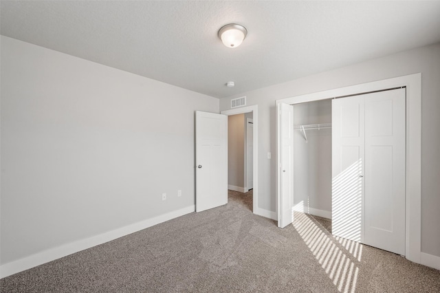 714 Umbra Pl, Norwalk, IA 50211 - unfurnished bedroom with carpet flooring, a closet, and baseboards