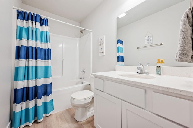 714 Umbra Pl, Norwalk, IA 50211 - bathroom featuring vanity, wood finished floors, toilet, and shower / bathtub combination with curtain
