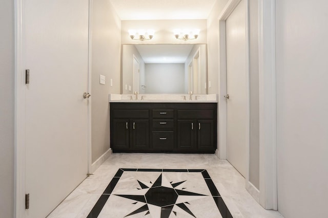1625 S 50th Pl, West Des Moines, IA 50265 - full bathroom featuring double vanity and baseboards