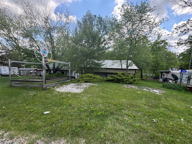 3170 Morman Trl, Ellston, IA 50074 - view of green lawn featuring a vegetable garden