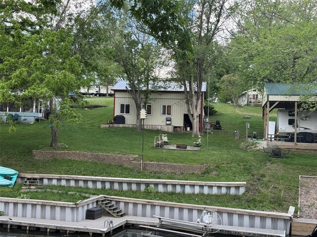 3170 Morman Trl, Ellston, IA 50074 - rear view of property with a yard