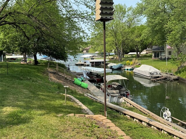 3170 Morman Trl, Ellston, IA 50074 - dock area with a water view and a yard
