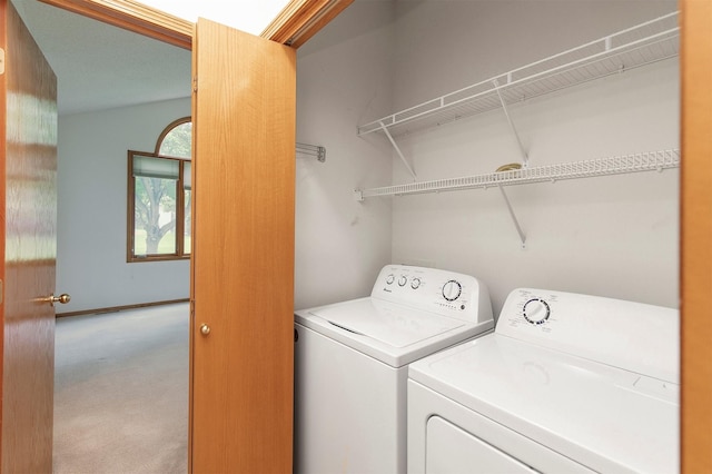 6799 NW 57th St, Johnston, IA 50131 - washroom with washing machine and dryer and carpet floors