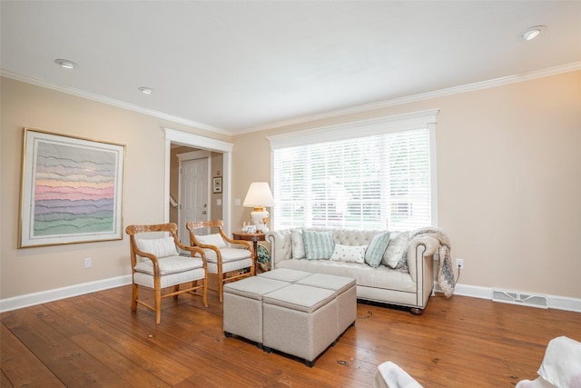 2403 Guenever Ct, Altoona, IA 50009 - living area with ornamental molding, baseboards, and wood-type flooring