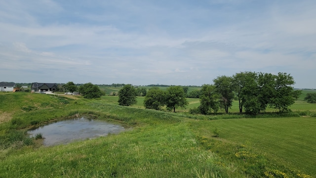 2313 Green Leaf Cir, Norwalk, IA 50211 - water view featuring rural landscape