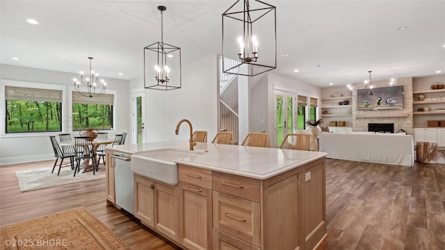 815 S Kingswood Ct, West Des Moines, IA 50266 - kitchen with a sink, dishwasher, dark wood-type flooring, recessed lighting, and a chandelier