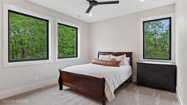 815 S Kingswood Ct, West Des Moines, IA 50266 - carpeted bedroom with multiple windows, baseboards, recessed lighting, and ceiling fan