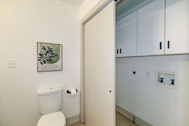 801 SE 5th St, Grimes, IA 50111 - laundry room with electric dryer hookup, washer hookup, baseboards, and cabinet space