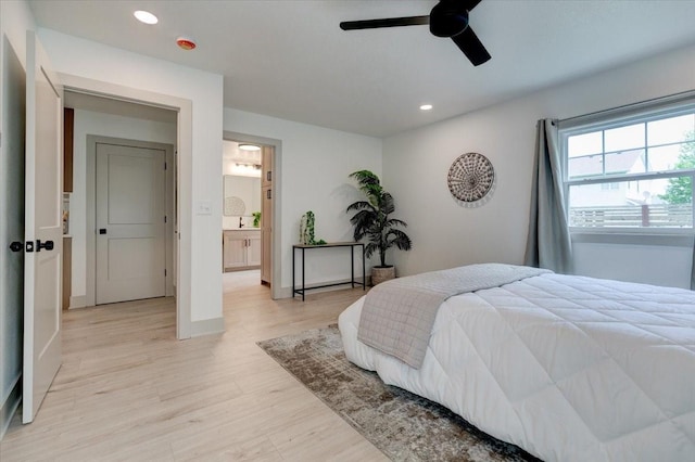 801 SE 5th St, Grimes, IA 50111 - bedroom featuring recessed lighting, light wood-style floors, a sink, a ceiling fan, and baseboards