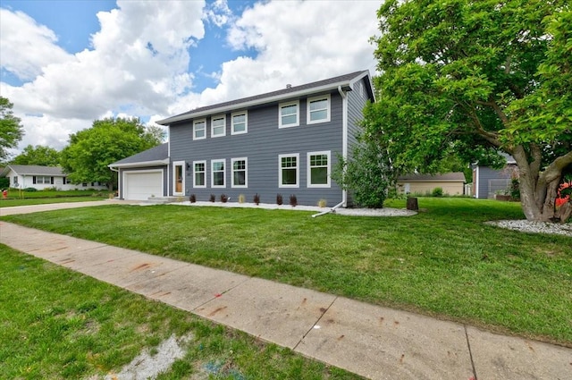 801 SE 5th St, Grimes, IA 50111 - colonial inspired home featuring concrete driveway, a garage, and a front yard