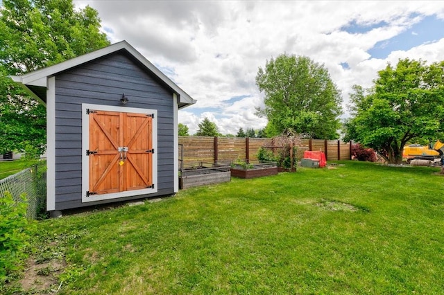 801 SE 5th St, Grimes, IA 50111 - view of shed with a garden