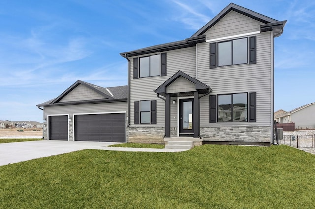 2925 6th Ave SW, Altoona, IA 50009 - view of front of property with stone siding, a garage, and driveway
