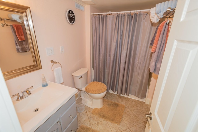 1055 40th St, Des Moines, IA 50311 - full bath with vanity, toilet, shower / bath combo, and tile patterned floors