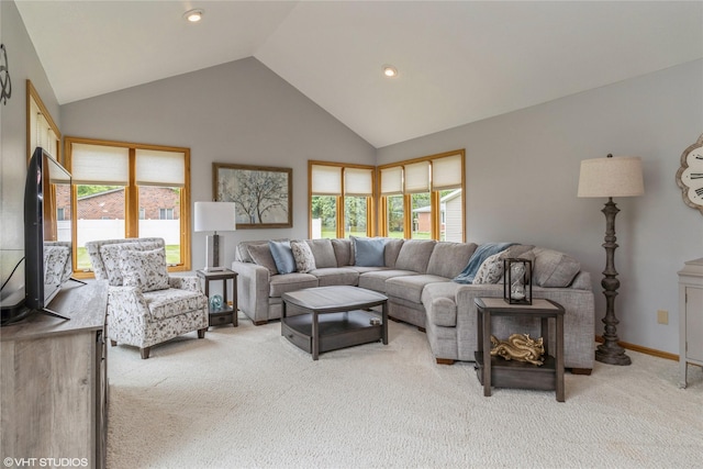 408 W 13th St N, Newton, IA 50208 - carpeted living room featuring plenty of natural light, high vaulted ceiling, and recessed lighting