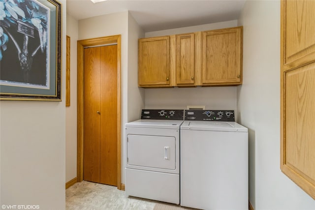 408 W 13th St N, Newton, IA 50208 - laundry area with washing machine and clothes dryer, cabinet space, and baseboards