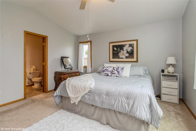 408 W 13th St N, Newton, IA 50208 - bedroom with light carpet, baseboards, ensuite bath, vaulted ceiling, and ceiling fan