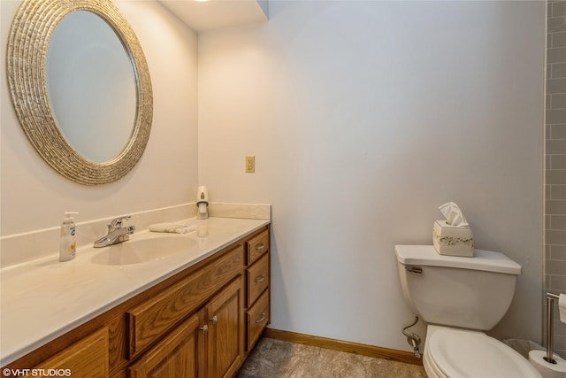 408 W 13th St N, Newton, IA 50208 - bathroom with toilet, vanity, and baseboards