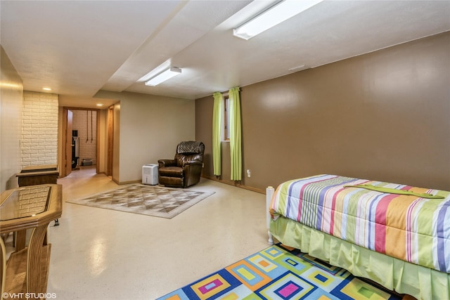 408 W 13th St N, Newton, IA 50208 - bedroom with baseboards and concrete floors