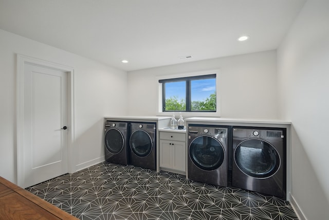 1004 NW Hugg Dr, Polk City, IA 50226 - laundry room with washer and clothes dryer, dark floors, baseboards, and recessed lighting