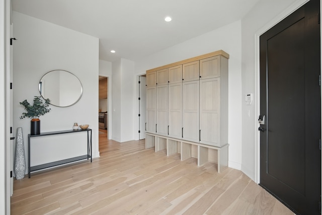 1004 NW Hugg Dr, Polk City, IA 50226 - mudroom with light wood-style flooring, recessed lighting, and baseboards