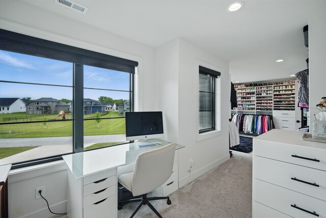 1004 NW Hugg Dr, Polk City, IA 50226 - office area with light carpet, baseboards, and recessed lighting