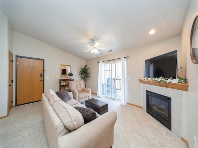 1355 SE 6th St Unit 301, Grimes, IA 50111 - carpeted living area featuring a fireplace, baseboards, a ceiling fan, and vaulted ceiling
