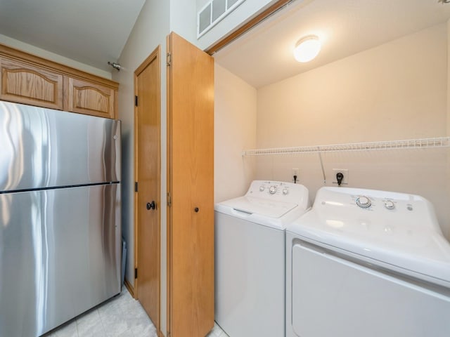 1355 SE 6th St Unit 301, Grimes, IA 50111 - laundry area featuring washer and dryer