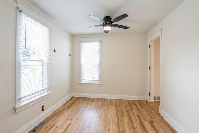 140 N 7th St, Carlisle, IA 50047 - empty room featuring light wood-type flooring, ceiling fan, and baseboards