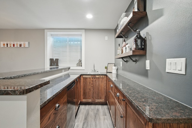 603 Elm Ct, Dallas Center, IA 50063 - indoor wet bar featuring light wood-style floors and dishwasher