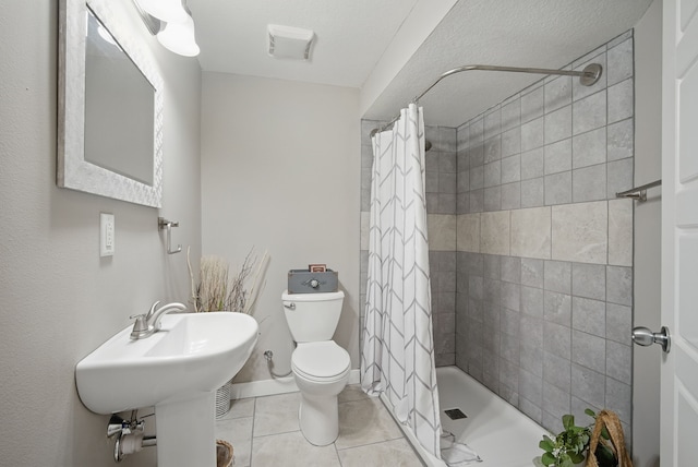 603 Elm Ct, Dallas Center, IA 50063 - full bathroom featuring tile patterned flooring and tiled shower