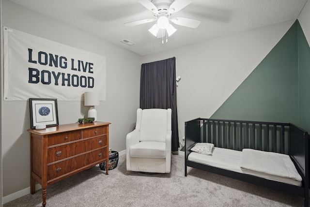 603 Elm Ct, Dallas Center, IA 50063 - carpeted bedroom with a ceiling fan and baseboards