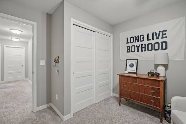 603 Elm Ct, Dallas Center, IA 50063 - living area with carpet and baseboards