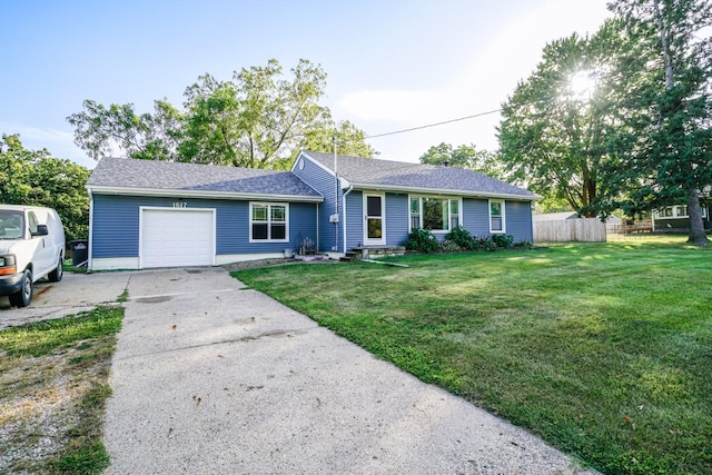 1617 Evergreen Ave, Des Moines, IA 50320 - single story home with a garage and concrete driveway