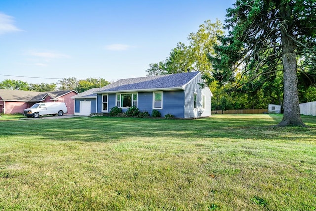 1617 Evergreen Ave, Des Moines, IA 50320 - ranch-style home with a shingled roof and driveway