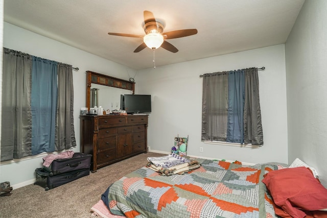 1617 Evergreen Ave, Des Moines, IA 50320 - bedroom with carpet flooring, ceiling fan, and baseboards