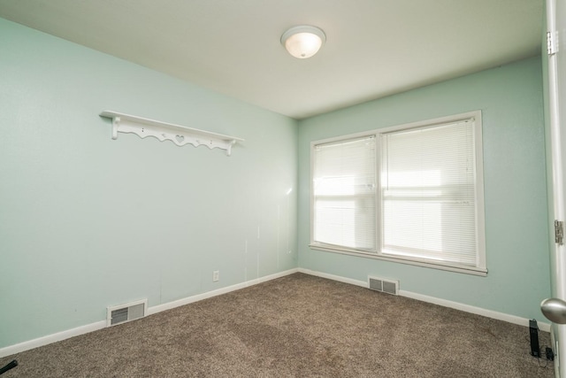 1617 Evergreen Ave, Des Moines, IA 50320 - carpeted spare room featuring baseboards