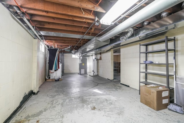 1617 Evergreen Ave, Des Moines, IA 50320 - unfinished below grade area featuring gas water heater and concrete block wall