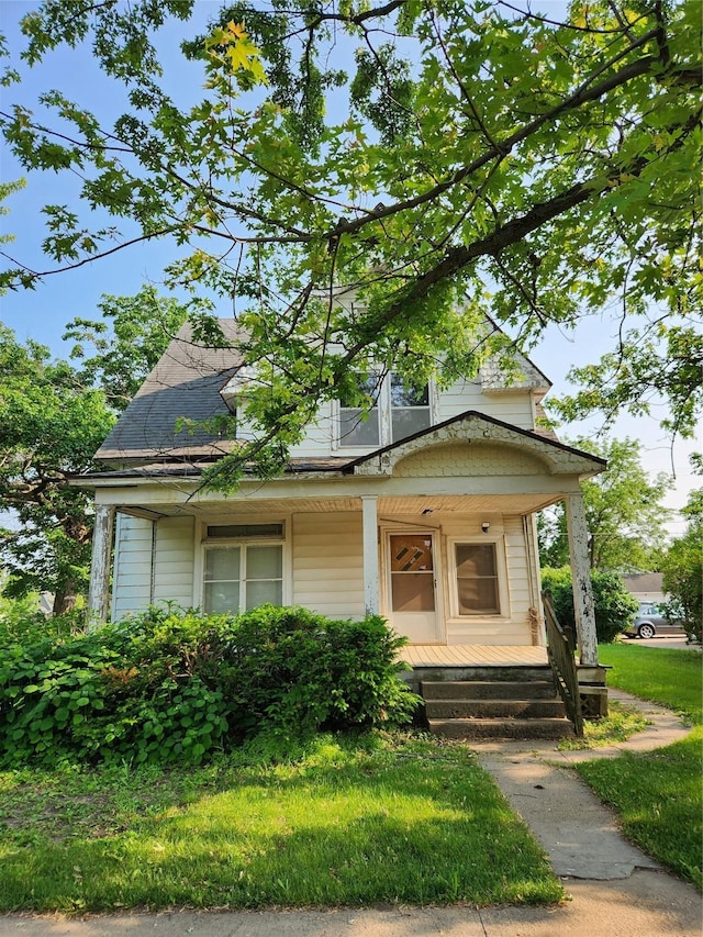 414 E Robinson St, Knoxville, IA 50138 - view of front facade featuring a porch