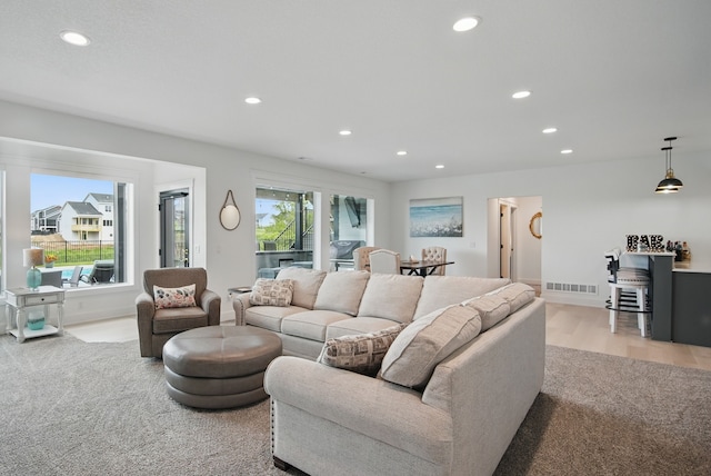 2216 Timberview Dr, Norwalk, IA 50211 - living area with recessed lighting and light wood-style floors